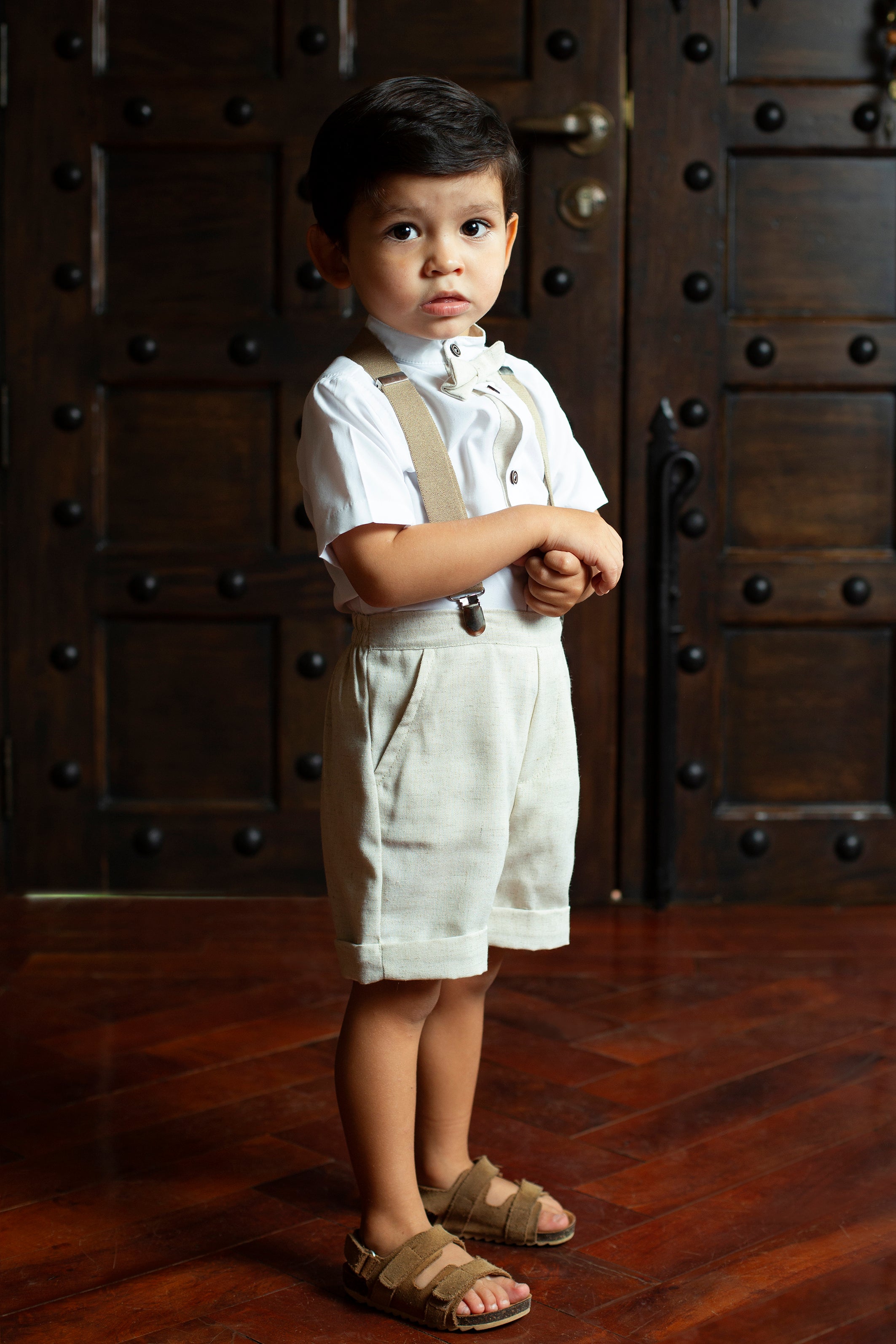 traje short tirantes moño niño